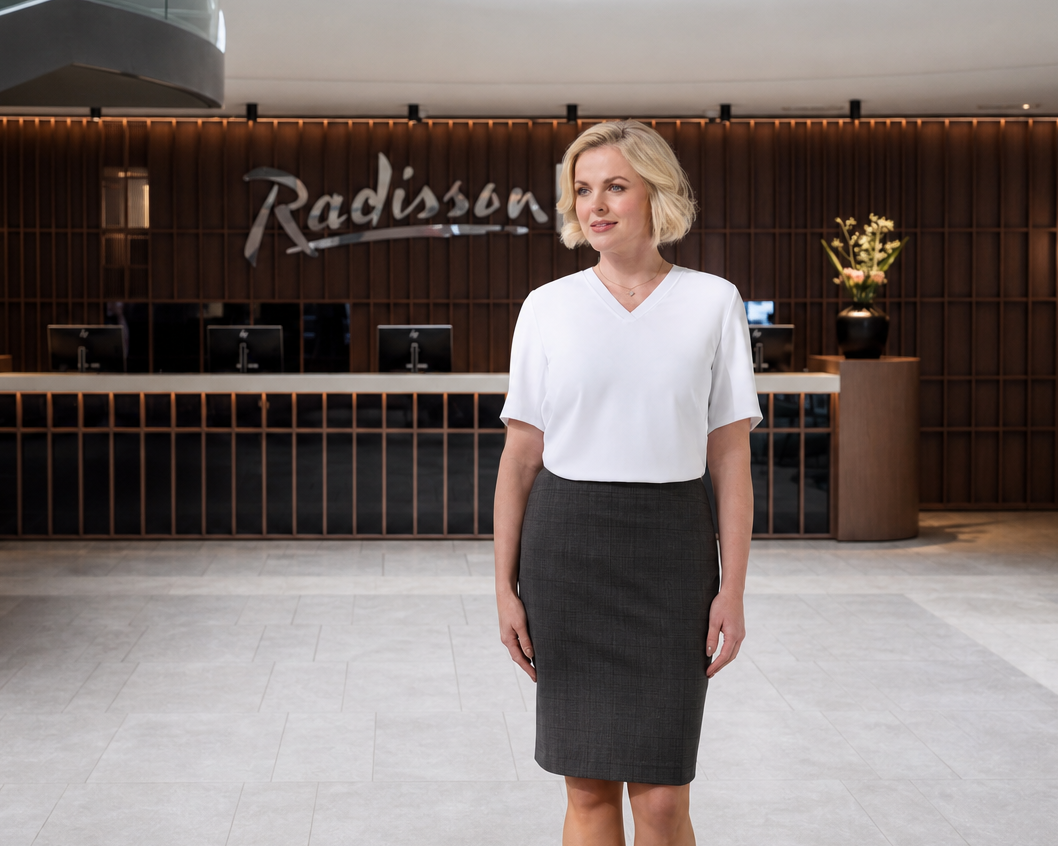 A woman stood in the reception of the radisson hotel