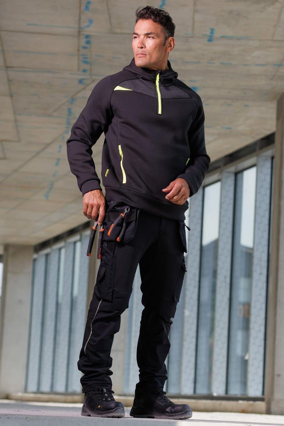 Man wearing Portwest DX4 Jacket and Trousers 